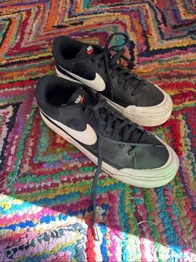 Nike Black Sneakers with White Swoosh and Cream Sole